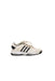 A White Sneakers from Adidas in size 5T for girl. (Back View)