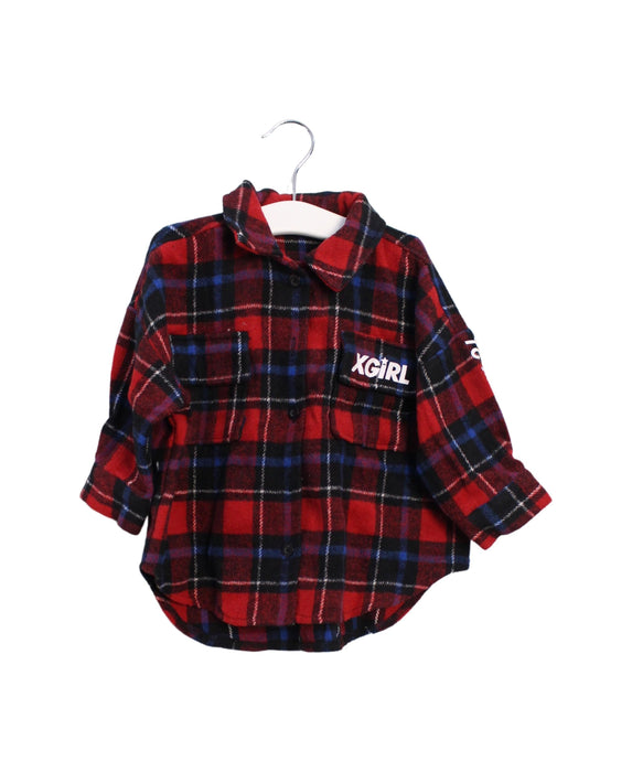 A Red Shirts from X-girl in size 12-18M for girl. (Front View)