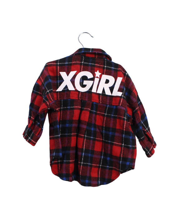 A Red Shirts from X-girl in size 12-18M for girl. (Back View)