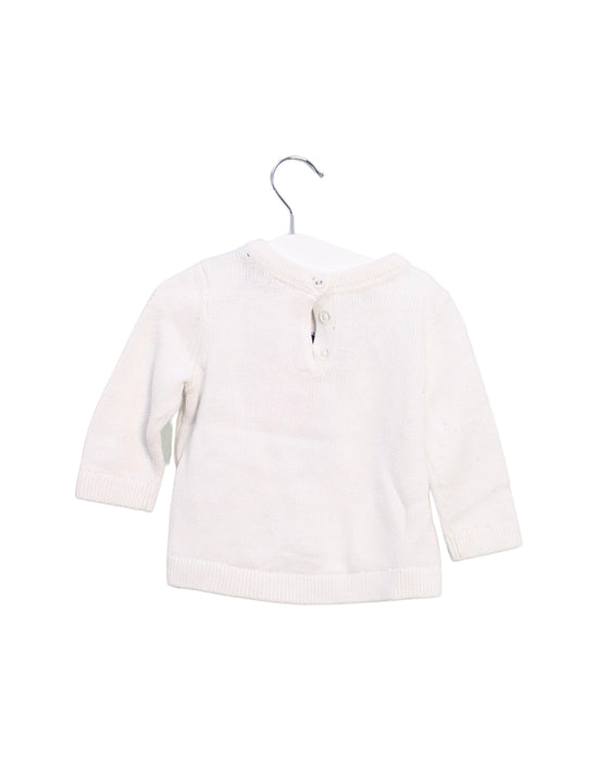A White Knit Sweaters from Tommy Hilfiger in size 6-12M for girl. (Back View)
