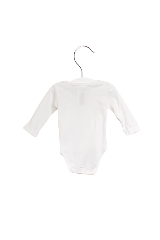 A White Long Sleeve Bodysuits from Jacadi in size 3-6M for girl. (Front View)