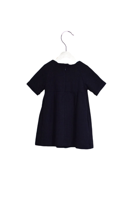 A Navy Short Sleeve Dresses from Little Mercerie in size 4T for girl. (Back View)