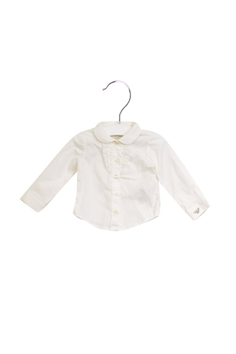 A White Shirts from Armani in size 3-6M for girl. (Front View)