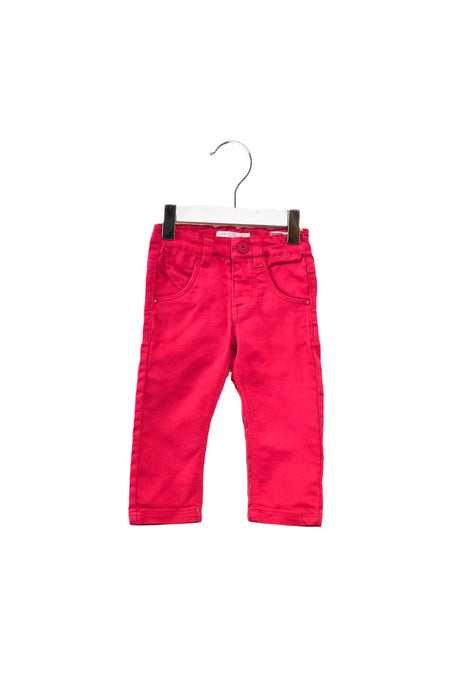 A Pink Casual Pants from Name It in size 6-12M for girl. (Front View)