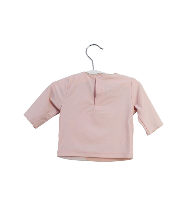A Pink Long Sleeve Tops from Mudpie in size 6-12M for girl. (Back View)