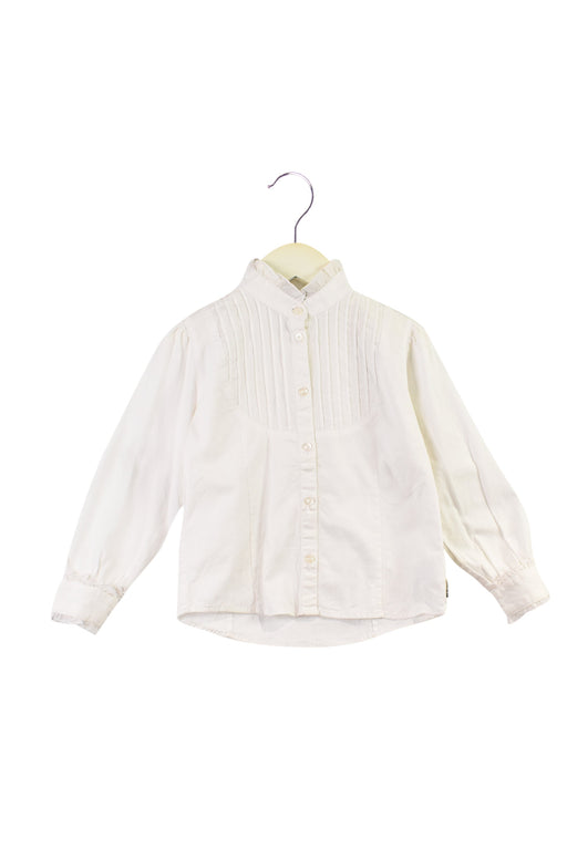 A White Shirts from Comme Ca Ism in size 4T for girl. (Front View)