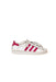 A White Sneakers from Adidas in size 5T for girl. (Back View)