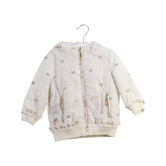A White Puffer/Quilted Jackets from Nicholas & Bears in size 6-12M for girl. (Front View)