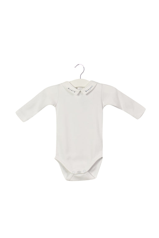 A White Long Sleeve Bodysuits from Jacadi in size 0-3M for girl. (Front View)