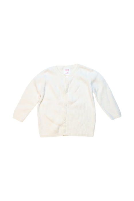 A White Cardigans from Seed in size 6-12M for girl. (Front View)