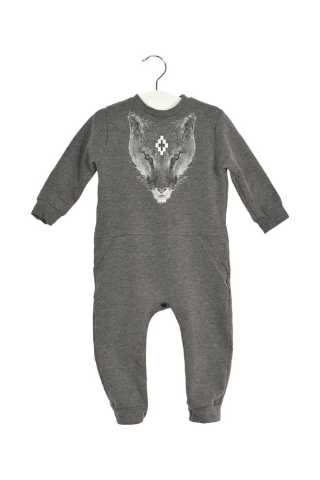 A Grey Long Sleeve Jumpsuits from Marcelo Burlon in size 6-12M for boy. (Front View)