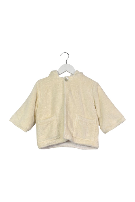 A White Bathrobes from Bonpoint in size 6-12M for neutral. (Front View)