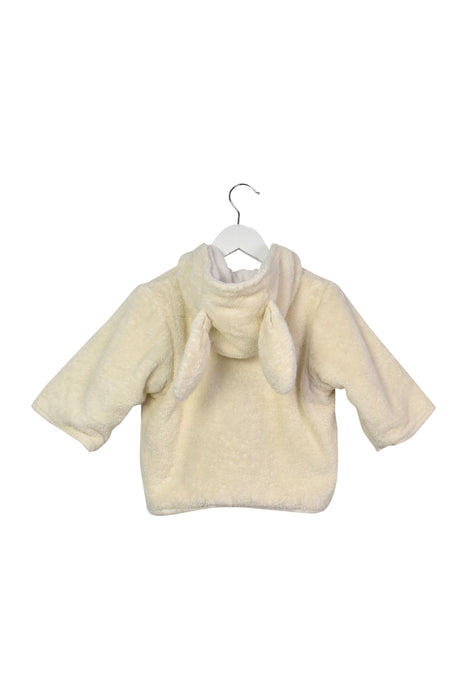 A White Bathrobes from Bonpoint in size 6-12M for neutral. (Back View)