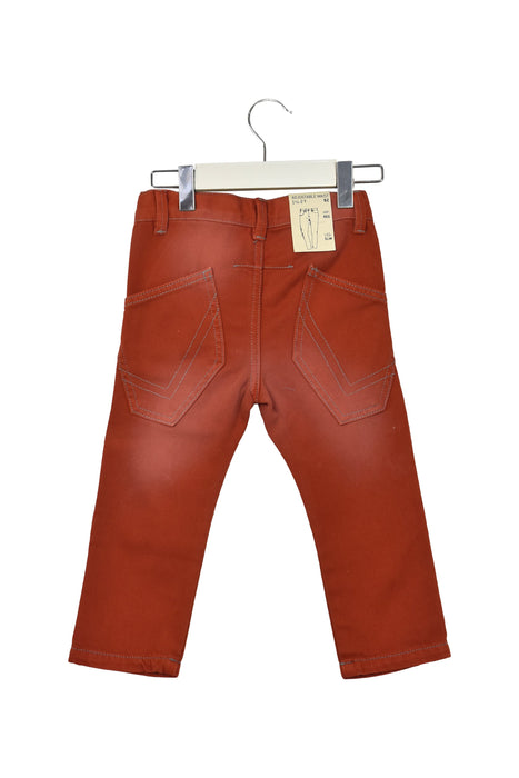 A Orange Casual Pants from Name It in size 18-24M for boy. (Back View)