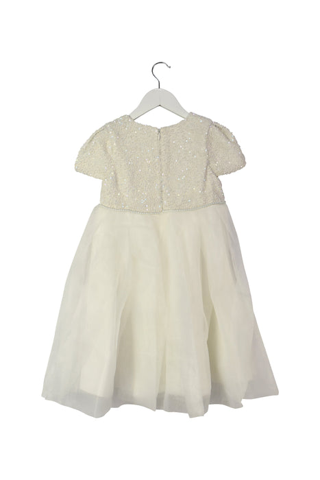 A White Short Sleeve Dresses from Mischka Aoki in size 6T for girl. (Back View)