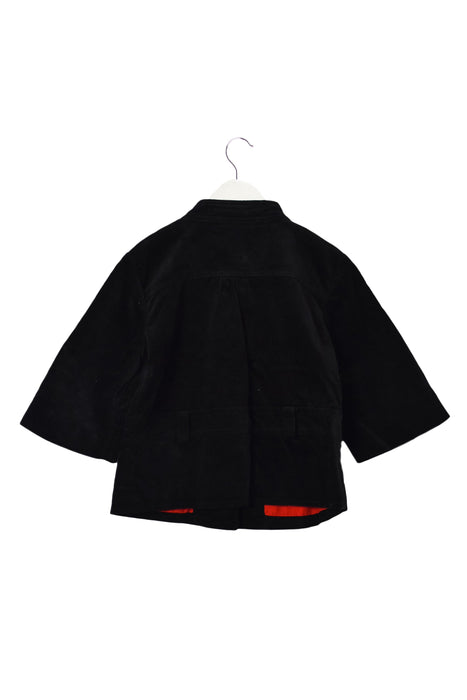 A Black Coats from Le Petit Pois in size 6T for boy. (Back View)