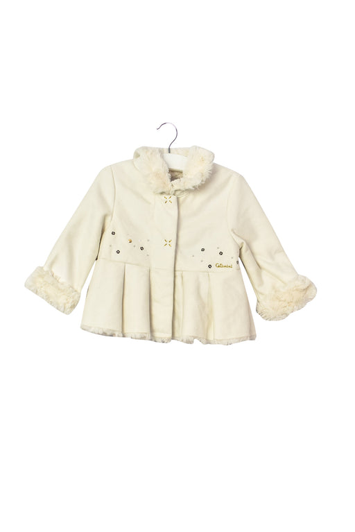 A White Coats from Catimini in size 6-12M for girl. (Front View)