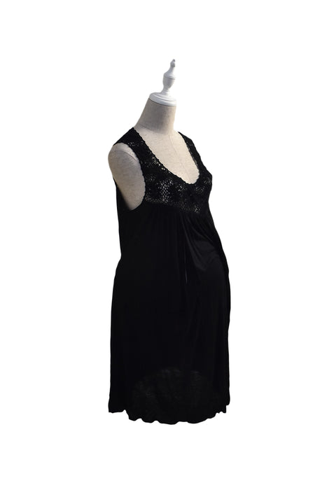 A Black Sleeveless Dresses from Comme Ca Du Mode in size L for maternity. (Front View)