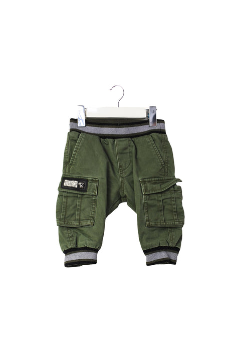 A Green Casual Pants from Diesel in size 3-6M for boy. (Front View)