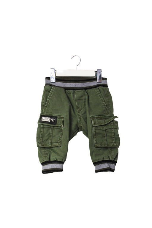 A Green Casual Pants from Diesel in size 3-6M for boy. (Front View)