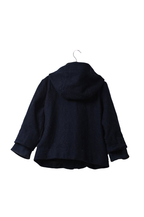 A Navy Coats from COS in size 12-18M for neutral. (Back View)