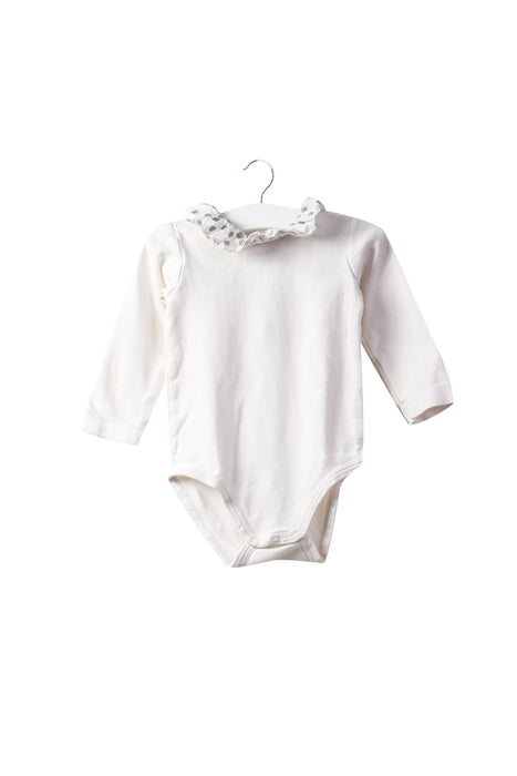 A White Long Sleeve Bodysuits from Jacadi in size 6-12M for girl. (Front View)