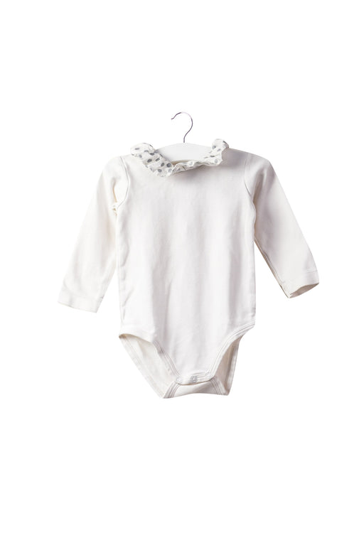 A White Long Sleeve Bodysuits from Jacadi in size 6-12M for girl. (Front View)