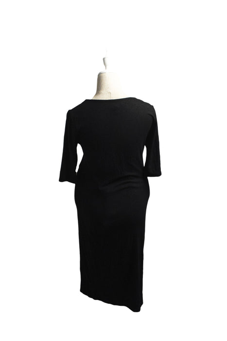 A Black Long Sleeve Dresses from Isabella Oliver in size S for maternity. (Back View)