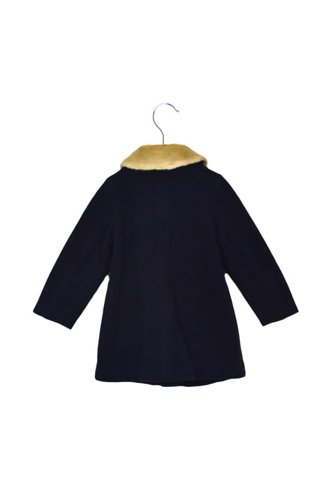 A Navy Coats from Miki House in size 4T for girl. (Back View)