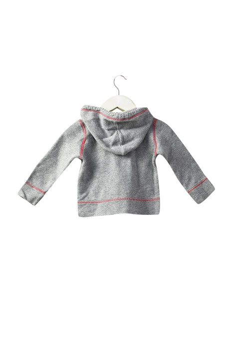 A Grey Zippered Sweatshirts from Zef in size 6-12M for girl. (Back View)