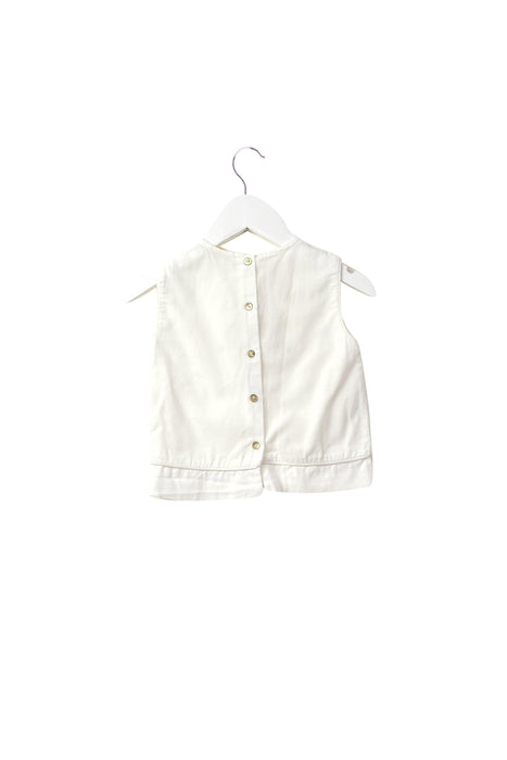 A White Sleeveless Tops from Les Enfantines in size 3-6M for girl. (Back View)