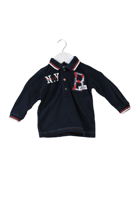 A Navy Long Sleeve Polos from IKKS in size 3-6M for boy. (Front View)
