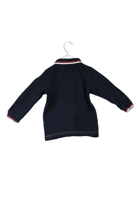 A Navy Long Sleeve Polos from IKKS in size 3-6M for boy. (Back View)