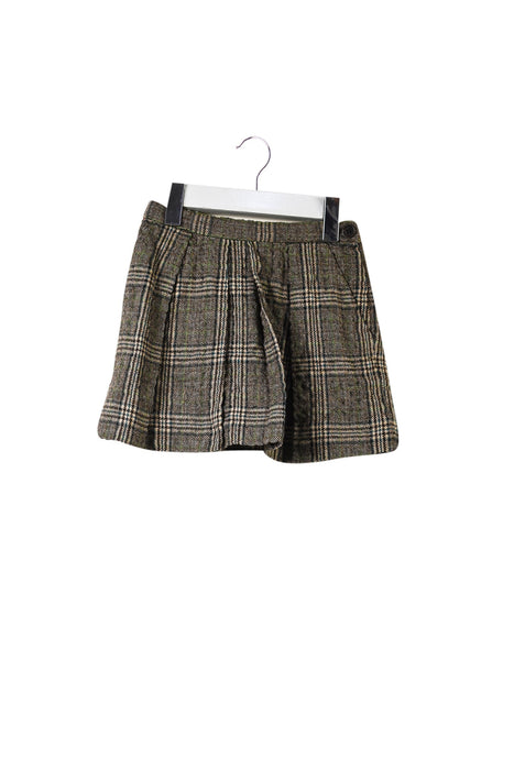 A Brown Short Skirts from Bonpoint in size 4T for girl. (Front View)