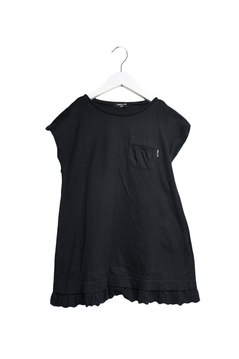 A Black Short Sleeve Dresses from Comme Ca Ism in size 5T for girl. (Front View)