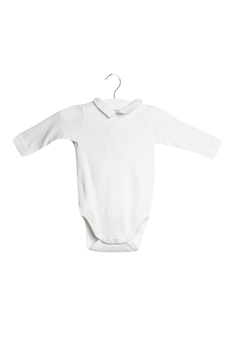 A White Long Sleeve Bodysuits from Jacadi in size 0-3M for neutral. (Front View)