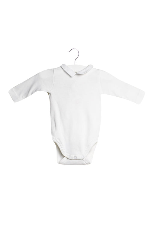 A White Long Sleeve Bodysuits from Jacadi in size 0-3M for neutral. (Front View)