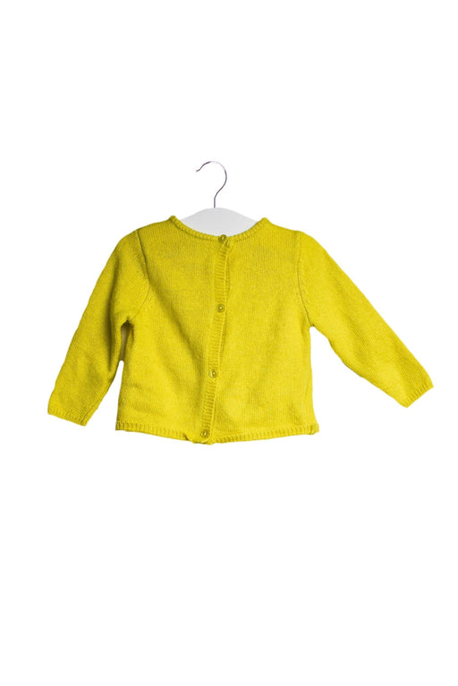 A Yellow Cardigans from CdeC in size 6-12M for girl. (Front View)