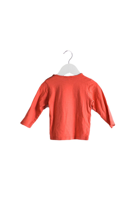 A Orange Long Sleeve Tops from Grain de Blé in size 3-6M for girl. (Back View)