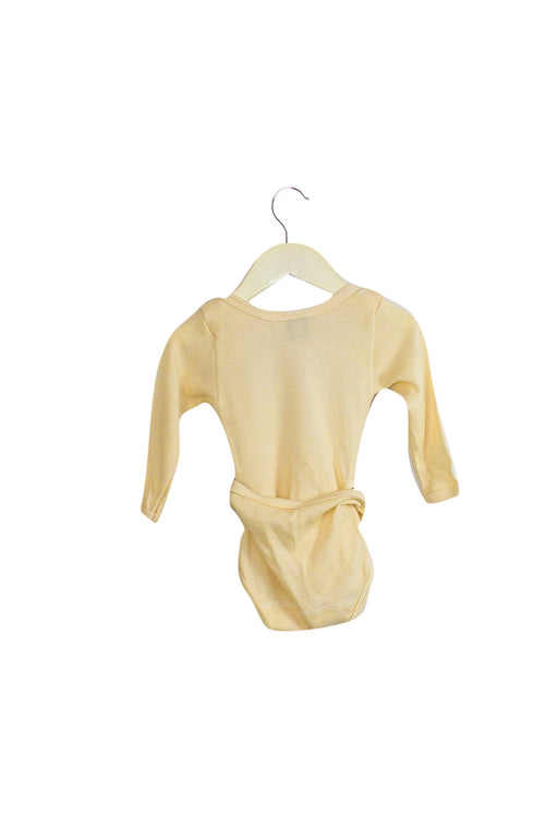 A Ivory Long Sleeve Bodysuits from Petit Bateau in size 12-18M for neutral. (Front View)