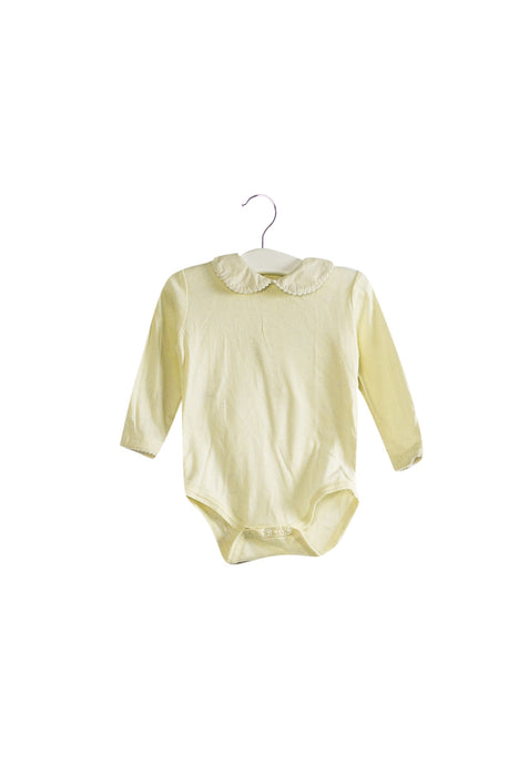 A Ivory Long Sleeve Bodysuits from Ralph Lauren in size 6-12M for girl. (Front View)