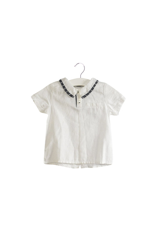 A White Short Sleeve Tops from bloomB in size 6-12M for girl. (Front View)