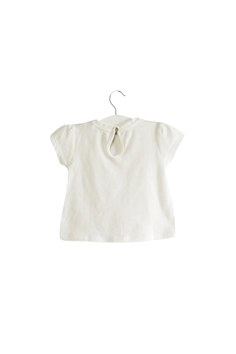 A White Short Sleeve T Shirts from Knot in size 0-3M for girl. (Back View)