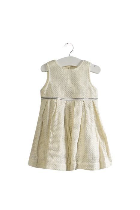A White Sleeveless Dresses from Bout'Chou in size 6-12M for girl. (Front View)