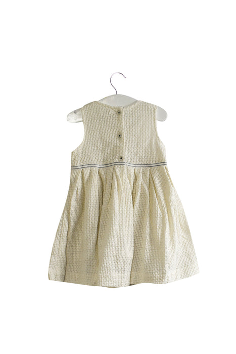A White Sleeveless Dresses from Bout'Chou in size 6-12M for girl. (Back View)
