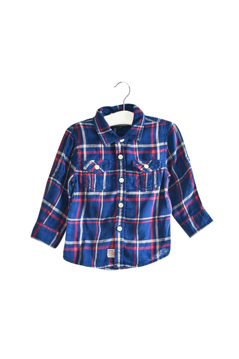 A Blue Shirts from Tommy Hilfiger in size 6-12M for boy. (Front View)