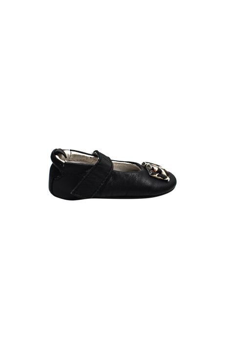 A Black Flats from Old Soles in size 3-6M for girl. (Back View)