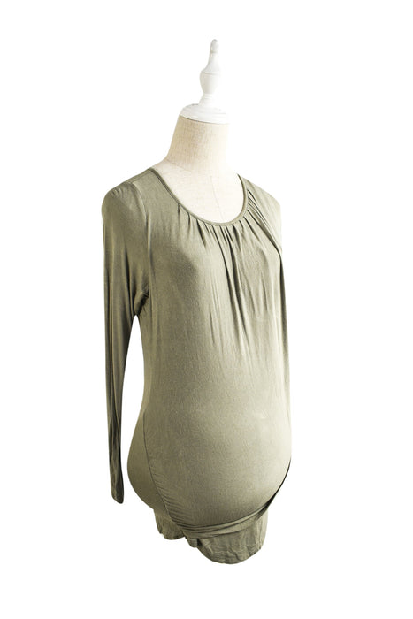 A Green Long Sleeve Tops from Mothers en Vogue in size XS for maternity. (Front View)