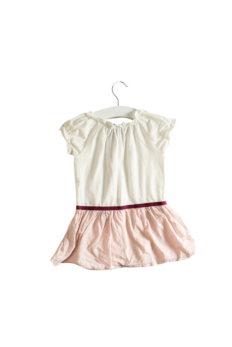 A White Short Sleeve Bodysuits from and the little dog laughed in size 3-6M for girl. (Back View)