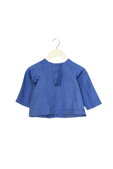 A Blue Long Sleeve Tops from Jacadi in size 6-12M for girl. (Front View)